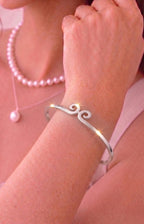 Eternal Swirl: Minimal Charm Bangle
