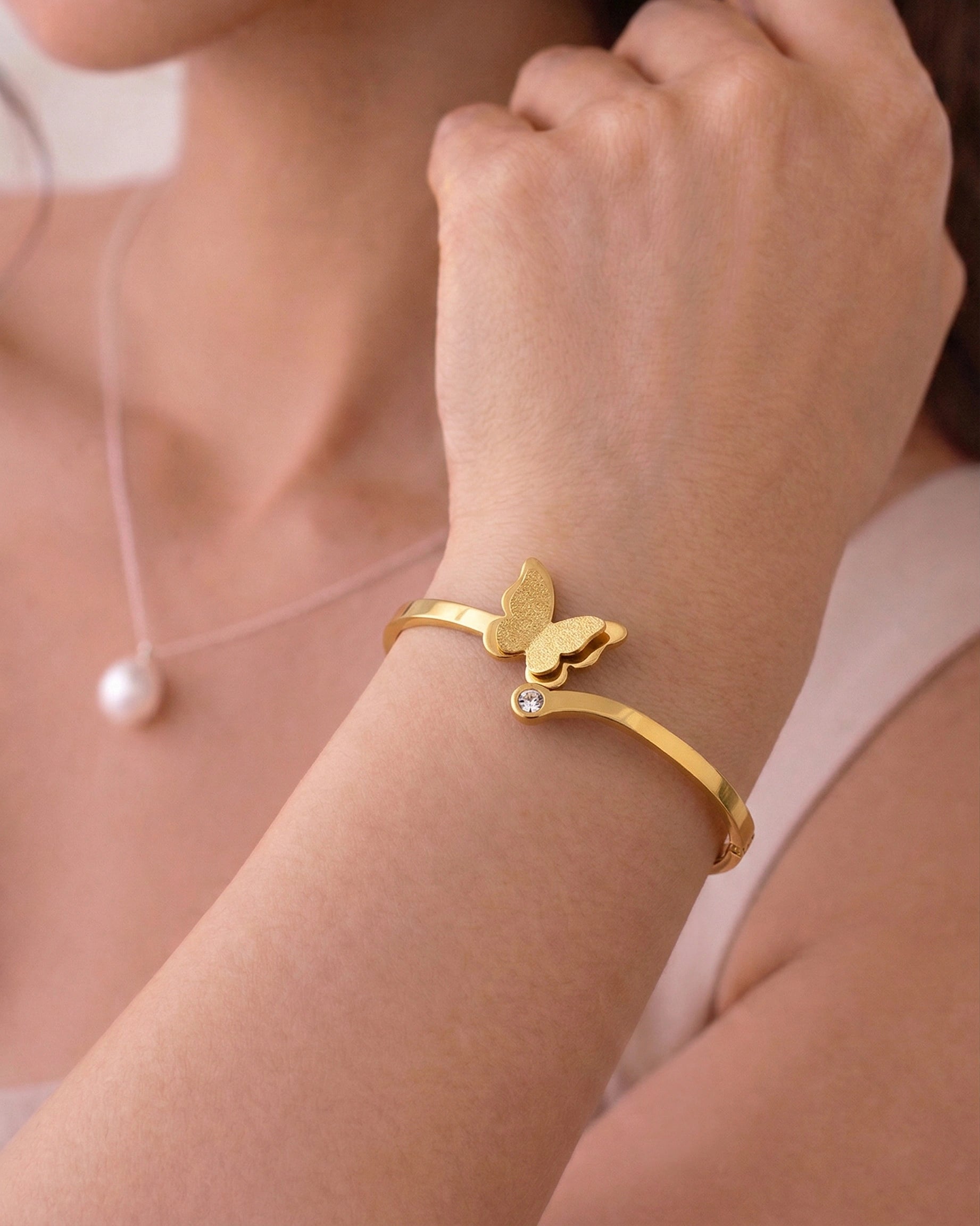 Whisper of Grace: Butterfly Charm Bangle