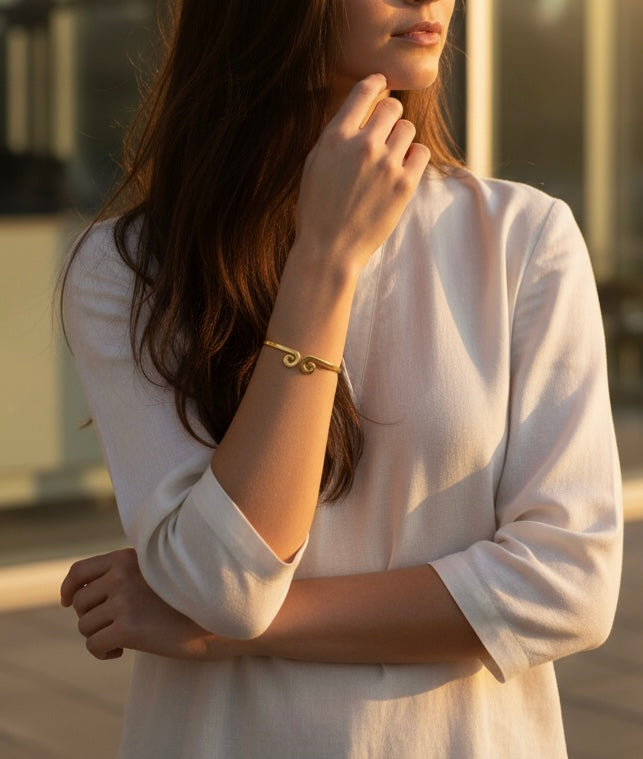 Eternal Swirl: Minimal Charm Bangle