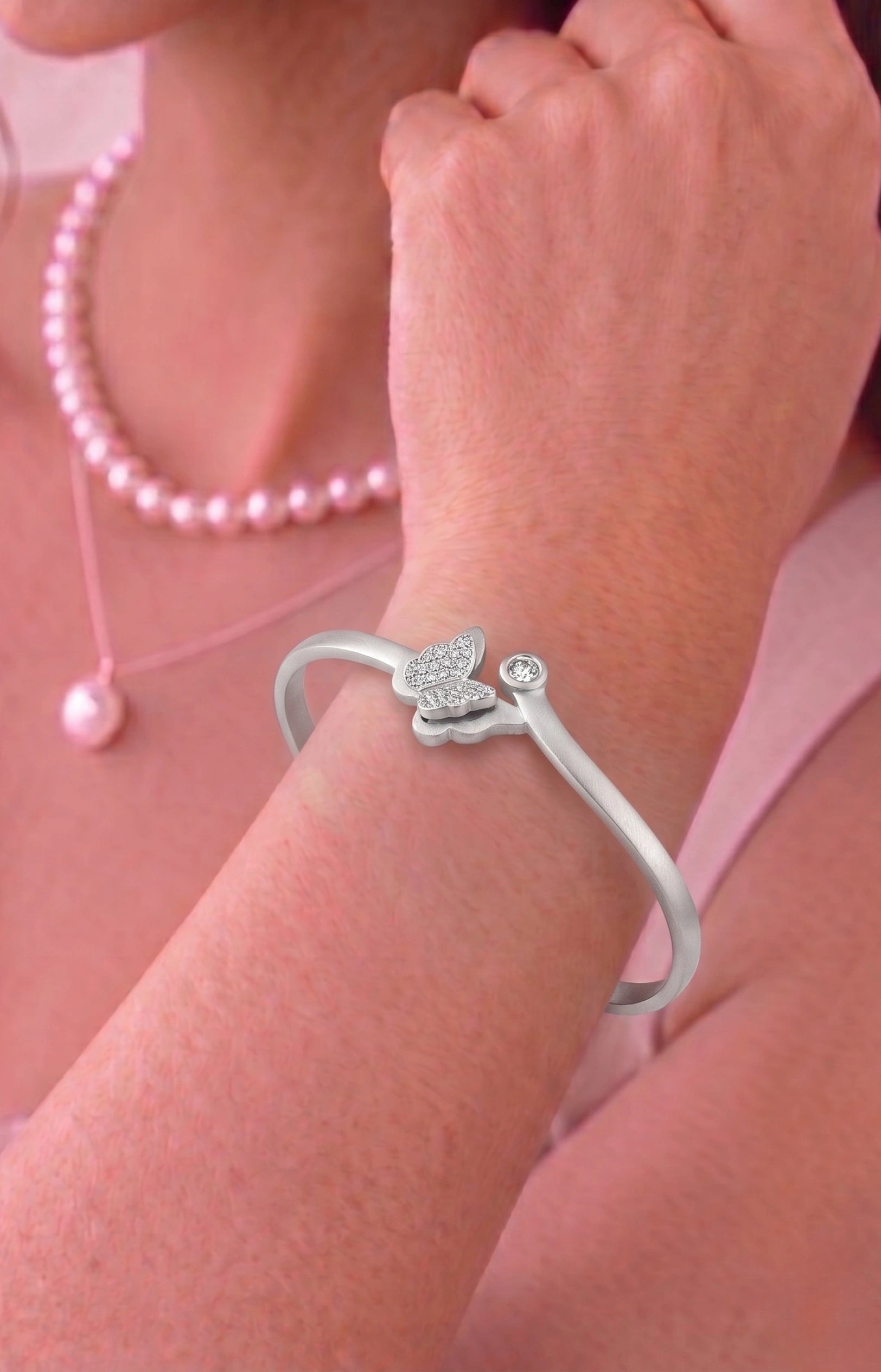 Whisper of Grace: Butterfly Charm Bangle